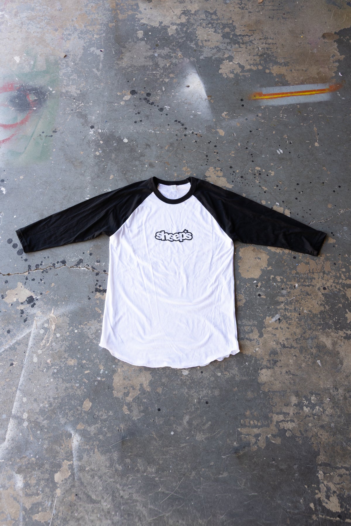 "WELL_ROUNDED" raglan tee