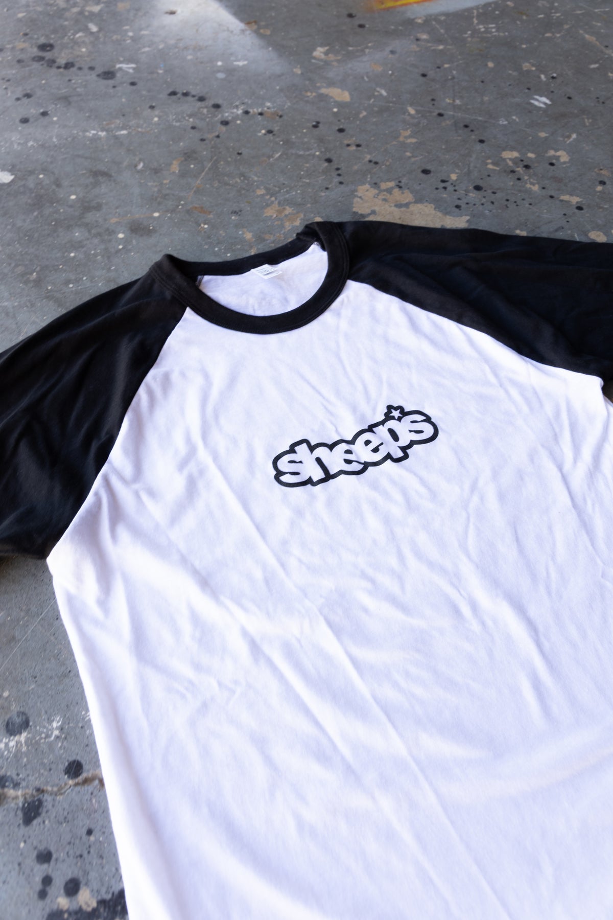 "WELL_ROUNDED" raglan tee